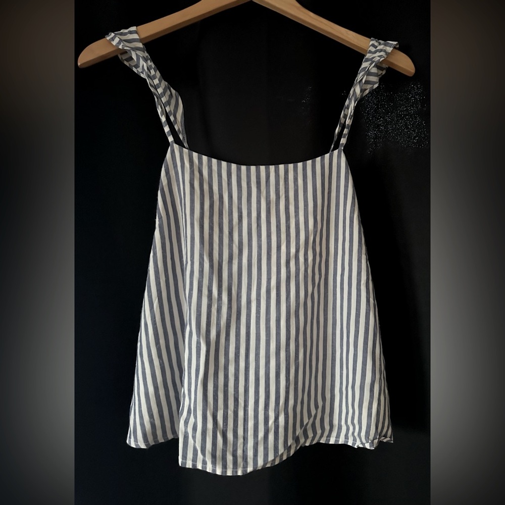 Blue and white striped tank top.